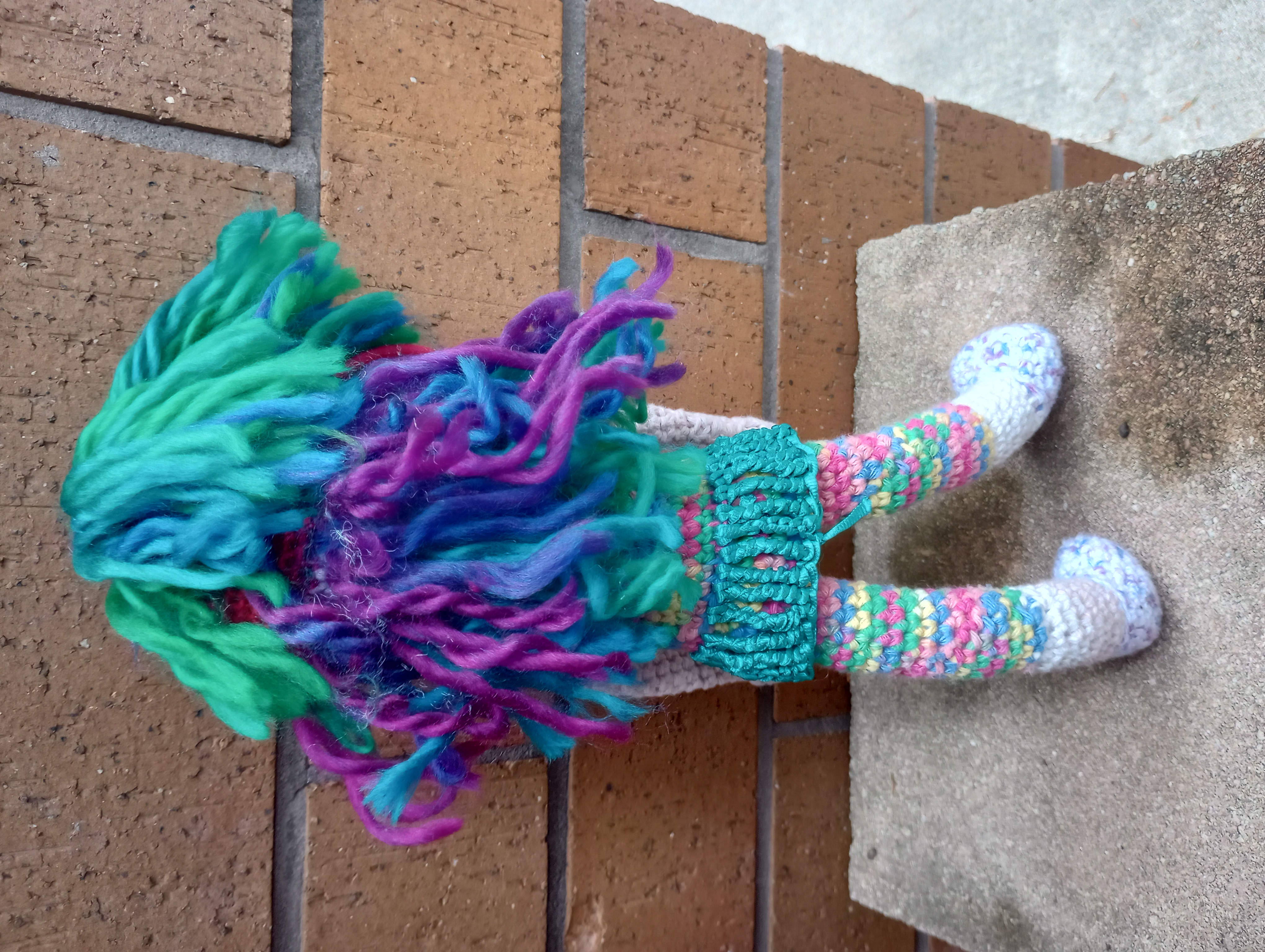 A view of the doll from behind, displaying the way her hair layers and flows down her back