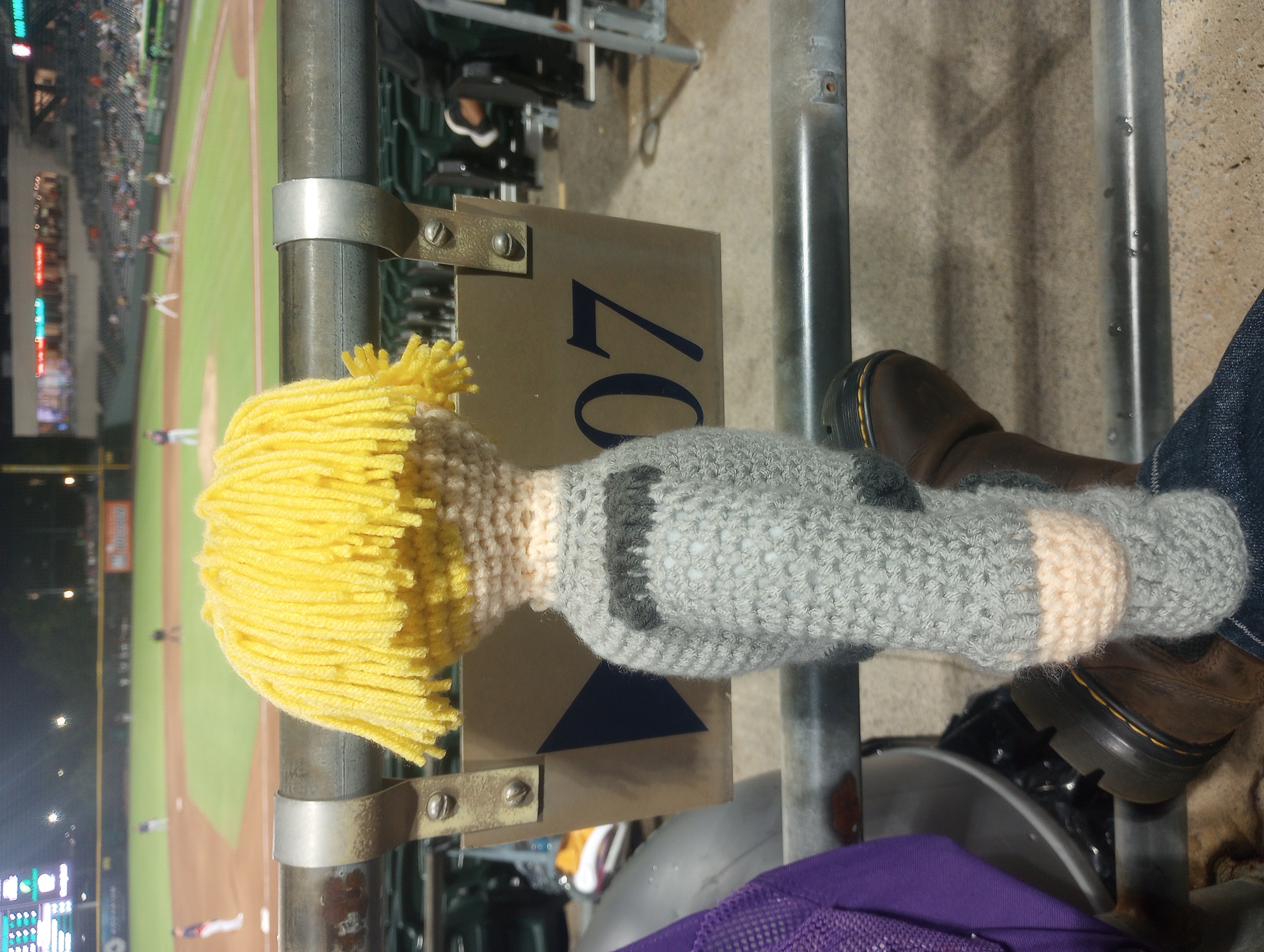 The same doll, seen from the side to highlight the haircut and armor accents