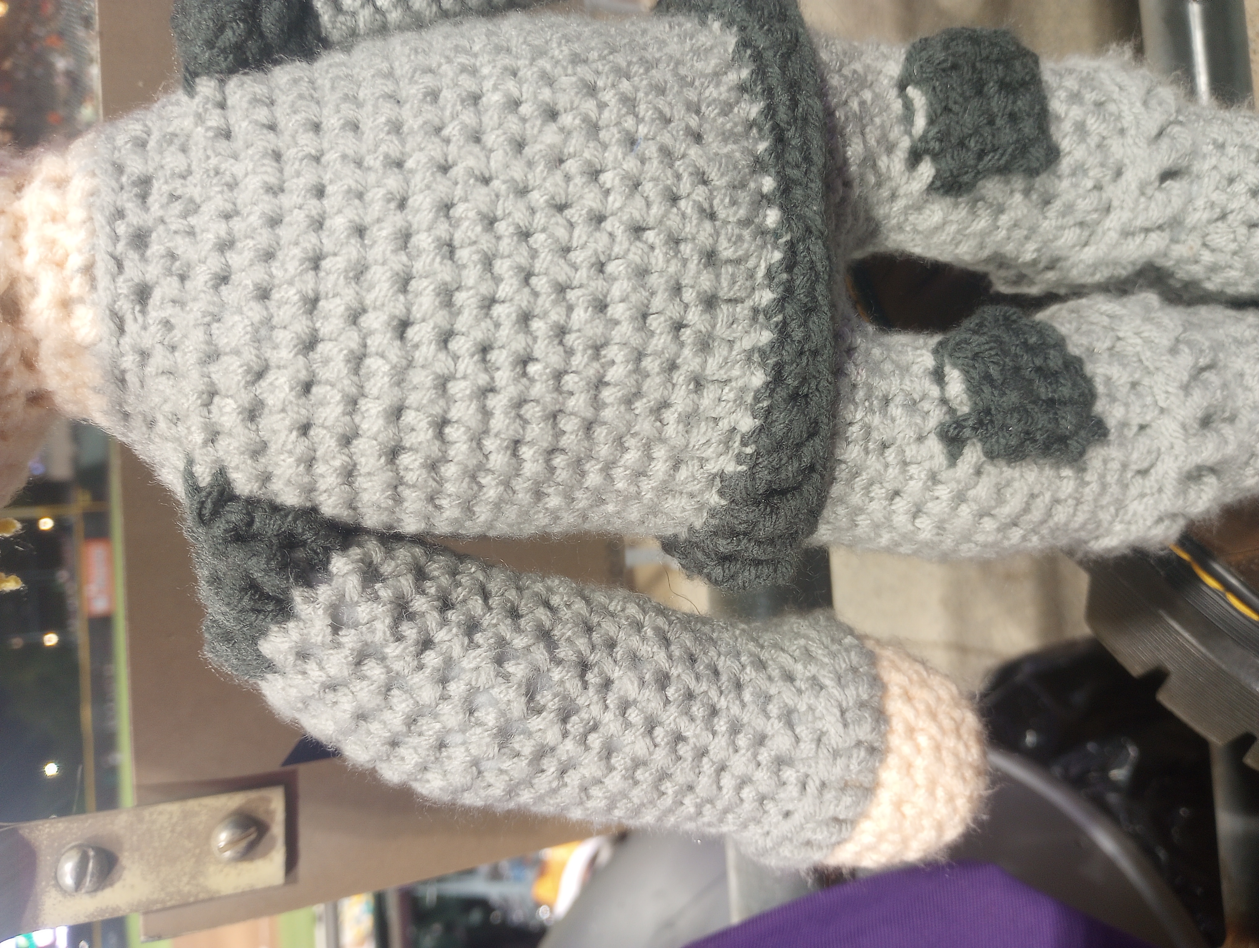 A closeup of the knees to shoulders of the doll, showing the kneepads, the trim on the breastplate, and the pauldrons